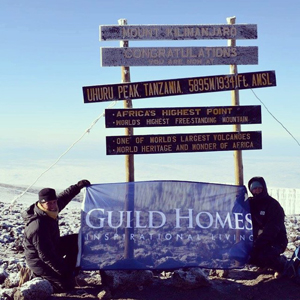 The Guild Homes team at the summit of Mount Kilimanjaro