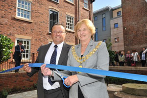 Jeff Guest and Mandy Meakin, Mayor of Wem, get ready to cut the ribbon